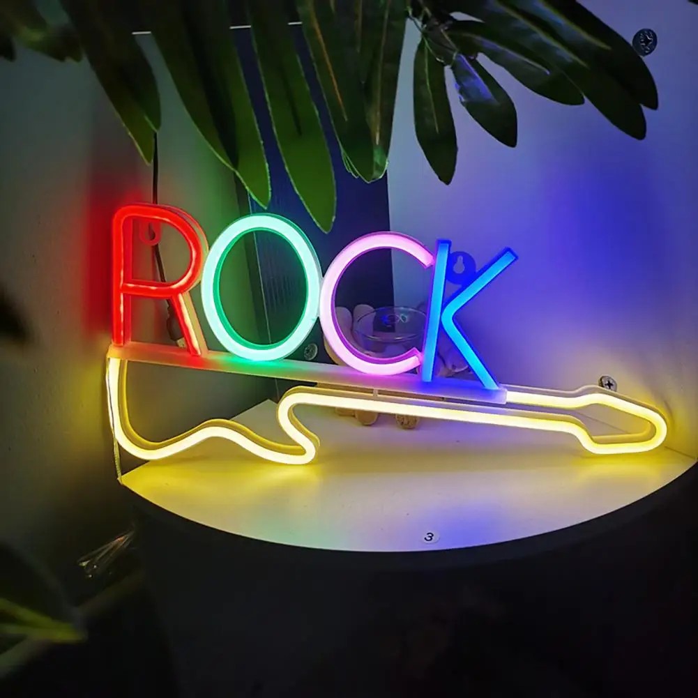 led neonskylt på väggen - rockgitarr